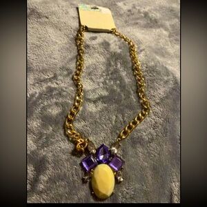 Necklace Beautiful Necklace with Purple And Cream Colored stone .